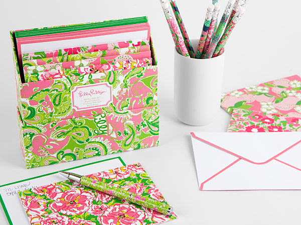 Retailer friendly notecard set. Product is shipped with lid on top of tray. Once retailer receives product, they flip lid over and place on bottom of tray. The notecards are arranged in a stair-step fashion so all notecard designs and envelopes can be reviewed. Envelopes are finished off with colored trim.