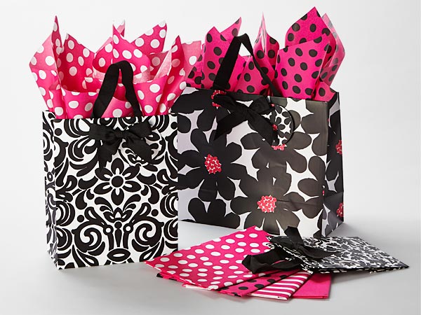Deluxe printed gift bags of various sizes with matching tissue paper.