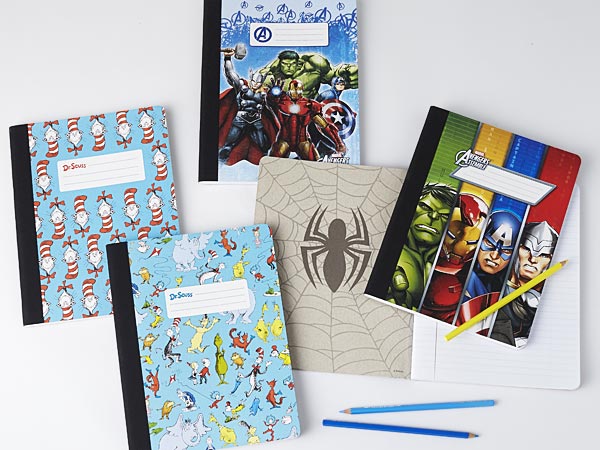 Composition books with sturdy, colorful covers, interior artwork, and lined pages.