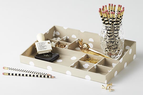Multi-compartment desk organizer stocked with bridge pencils, rotating stamp with custom sayings, gold electroplated push pins and paper clips, and deluxe brass snail letter opener.